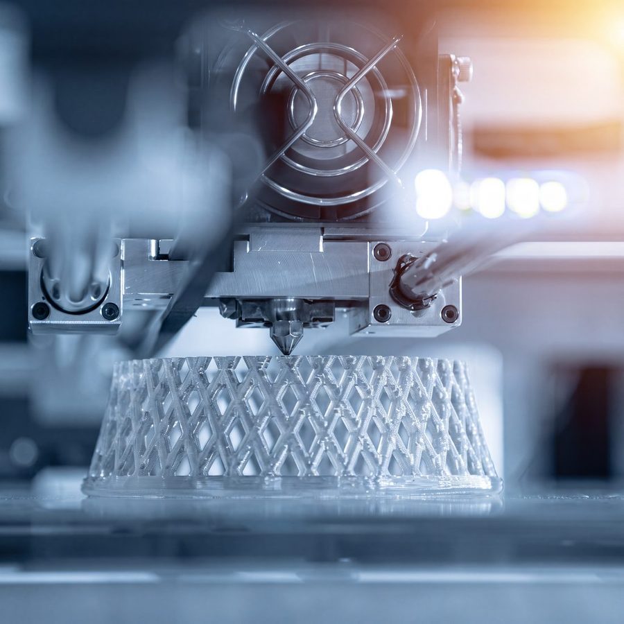 3D printer actively printing a lattice-pattern part